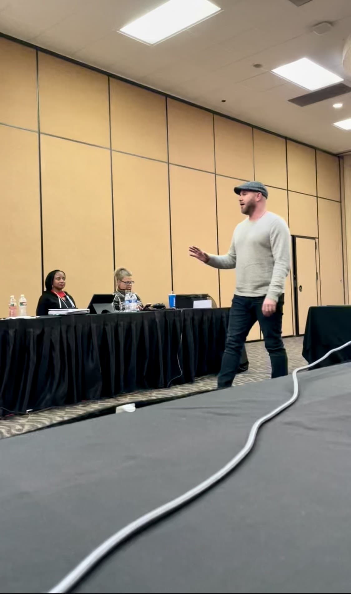 Michael Taylor presenting to an executive panel